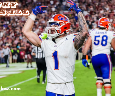 Ricky Pearsall celebrating on the football field during a game, wearing a Florida Gators uniform with number 1.